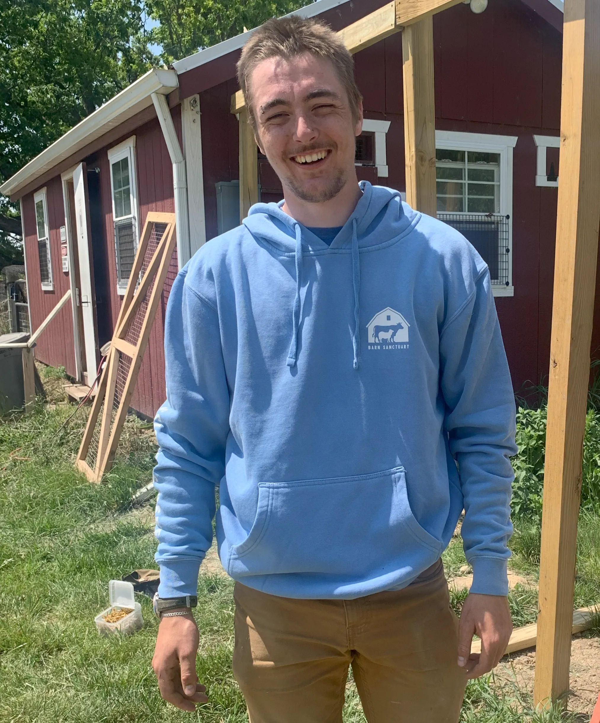 "Compassion Lives Here" Pullover Hoodie - Light Blue